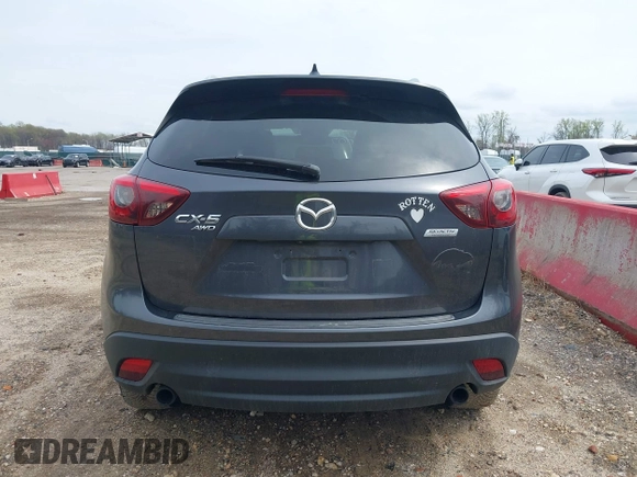 2016 Mazda CX-5 Grand Touring with VIN JM3KE4DYXG0830150, listed as a IAAI auction lot 41961007 with 142,570 mi miles and . Bid and sale history available at DreamBid. Image 16.