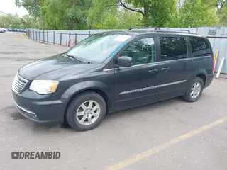 2012 Chrysler Town & Country Touring with VIN 2C4RC1BG1CR312532, listed as a IAAI auction lot 42194864 with 197,609 mi miles and . Bid and sale history available at DreamBid. Image 2.