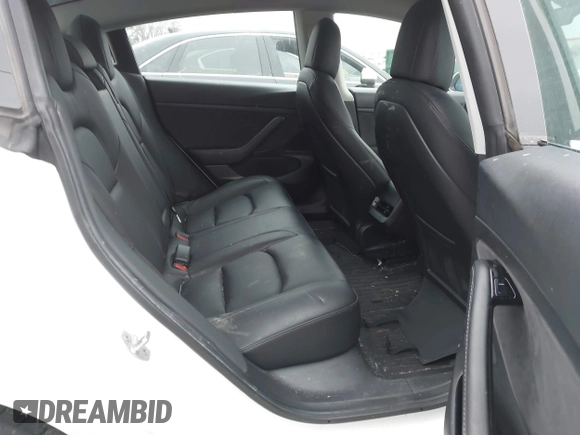 2020 Tesla Model 3 Standard Range Plus with VIN 5YJ3E1EA1LF799766, listed as a IAAI auction lot 41386508 with 90,000 mi miles. Bid and sale history available at carsss.com. Image 8.