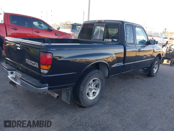 1999 Mazda B-Series 2WD Truck SE with VIN 4F4YR16V8XTM09770, listed as a IAAI auction lot 41416620 with 245,604 mi miles. Bid and sale history available at carsss.com. Image 4.