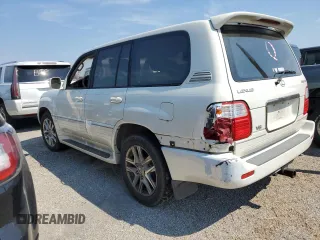 2000 Lexus LX 470 with VIN JT6HT00W2Y0106774, listed as a Copart auction lot 74762004 with Not Provided miles and Salvage Title. Bid and sale history available at DreamBid. Image 2.