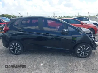 2016 Honda Fit LX with VIN JHMGK5H58GX002388, listed as a IAAI auction lot 41957350 with 127,211 mi miles. Bid and sale history available at carsss.com. Image 13.
