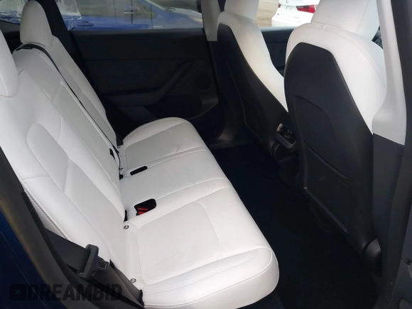 2023 Tesla Model Y Long Range with VIN 7SAYGDEE6PF947827, listed as a IAAI auction lot 41443524 with 12,381 mi miles and . Bid and sale history available at DreamBid. Image 8.