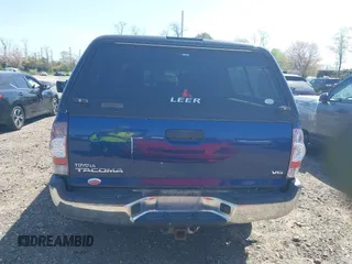 2014 Toyota Tacoma with VIN 3TMLU4EN4EM154261, listed as a IAAI auction lot 42119237 with 211,929 mi miles and . Bid and sale history available at DreamBid. Image 17.