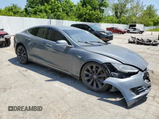 2014 Tesla Model S 60 z VIN 5YJSA1H13EFP36058, wystawiony jako Copart lot #57041725 z przebiegiem Nie podano mil oraz Szkoda całkowita • Salvage title. Historia ofert i sprzedaży dostępna na DreamBid. Obrazek 4.
