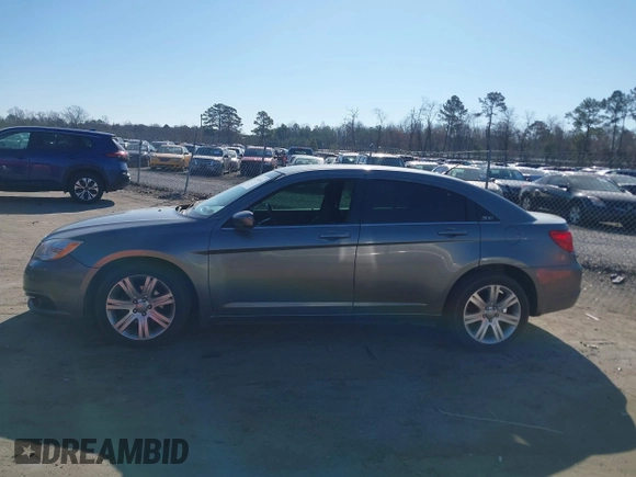 2012 Chrysler 200 Touring with VIN 1C3CCBBG9CN299980, listed as a IAAI auction lot 41689514 with 122,819 mi miles and . Bid and sale history available at carsss.com. Image 14.