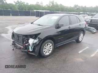 2020 Chevrolet Equinox LS with VIN 2GNAXHEVXL6282184, listed as a IAAI auction lot 42102233 with 56,968 mi miles and . Bid and sale history available at DreamBid. Image 2.