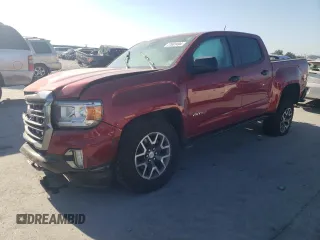 2021 GMC Canyon 4WD AT4 w/Cloth with VIN 1GTG6FEN2M1224875, listed as a Copart auction lot 77651494 with 81,495 mi miles and Salvage Title. Bid and sale history available at carsss.com. Image 1.