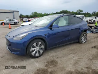 2023 Tesla Model Y Long Range z VIN 7SAYGAEE7PF663198, wystawiony jako Copart lot #54260295 z przebiegiem 72 031 mil mil oraz Szkoda całkowita • Salvage title. Historia ofert i sprzedaży dostępna na DreamBid. Obrazek 1.