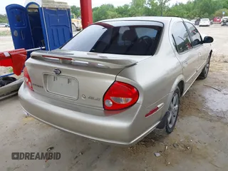 2000 Nissan Maxima GXE z VIN JN1CA31D8YT744603, wystawiony jako IAAI lot #42435490 z przebiegiem Nie podano mil oraz . Historia ofert i sprzedaży dostępna na DreamBid. Obrazek 4.