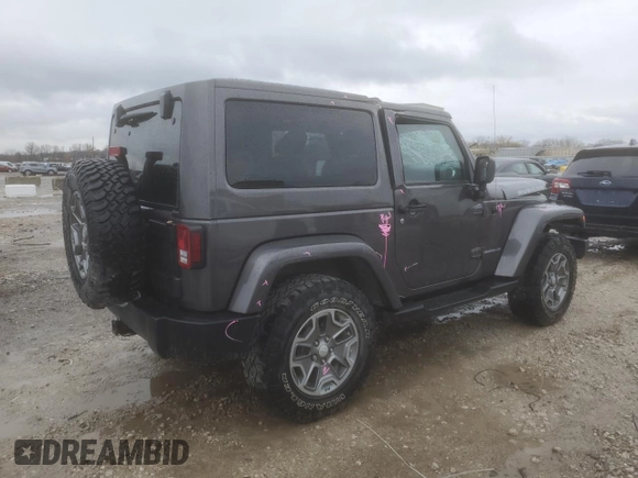 2014 Jeep Wrangler Rubicon with VIN 1C4BJWCG9EL189819, listed as a Copart auction lot 80522204 with 82,083 mi miles and Salvage title. Bid and sale history available at DreamBid. Image 3.