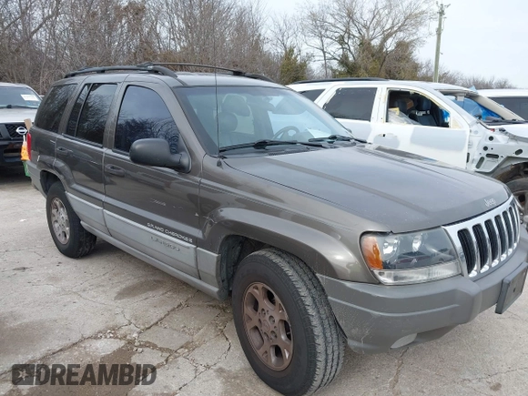 1999 Jeep Grand Cherokee Laredo с VIN 1J4G258S8XC650533, выставлен на аукционе IAAI как лот 41583331 с пробегом 245 164 миль миль и . История ставок и продаж доступна на DreamBid. Изображение 6.