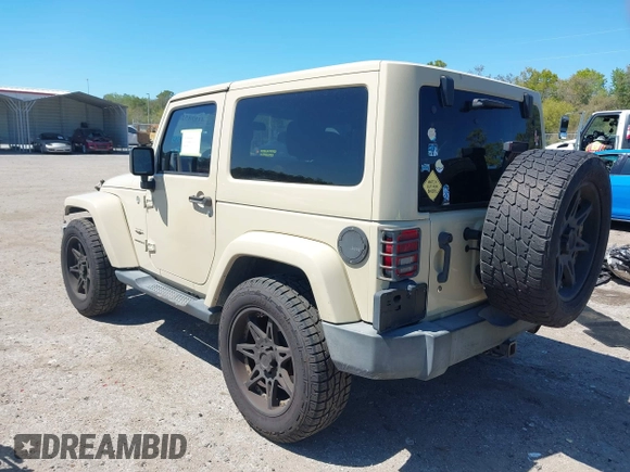 2011 Jeep Wrangler Sahara with VIN 1J4AA5D13BL562732, listed as a IAAI auction lot 41838520 with 148,359 mi miles and . Bid and sale history available at DreamBid. Image 3.