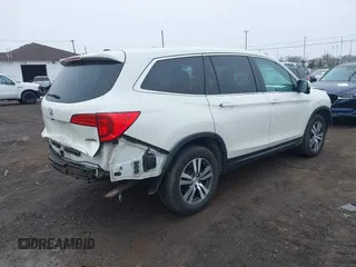 2018 Honda Pilot EX-L with VIN 5FNYF6H52JB053046, listed as a IAAI auction lot 42013210 with 103,721 mi miles. Bid and sale history available at carsss.com. Image 4.