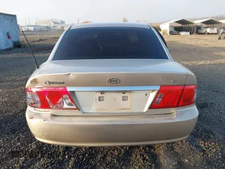 2004 Kia Optima LX z VIN KNAGD126045302372, wystawiony jako IAAI lot #41022315 z przebiegiem 199 588 mil mil oraz . Historia ofert i sprzedaży dostępna na DreamBid. Obrazek 17.