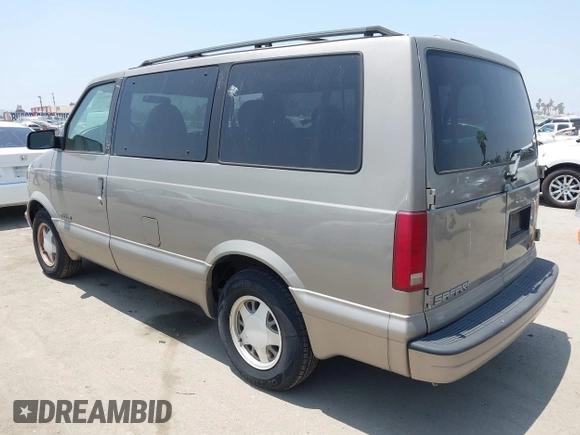 2001 GMC Safari z VIN 1GKDM19W21B502635, wystawiony jako IAAI lot #42368626 z przebiegiem 150 336 mil mil oraz . Historia ofert i sprzedaży dostępna na DreamBid. Obrazek 3.