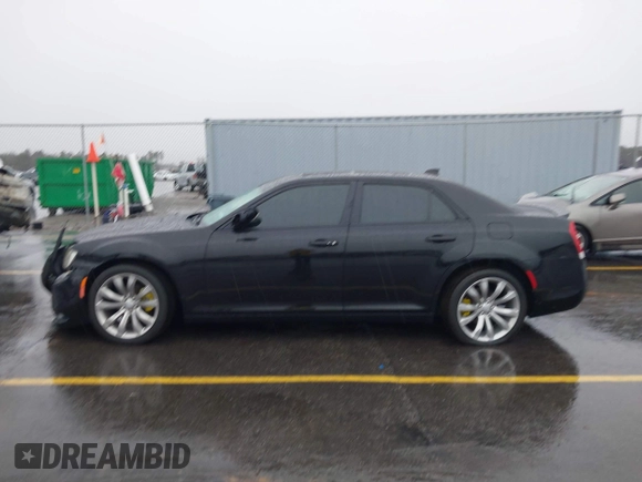 2015 Chrysler 300 C with VIN 2C3CCAEG8FH786879, listed as a IAAI auction lot 41563321 with 130,060 mi miles and . Bid and sale history available at carsss.com. Image 14.