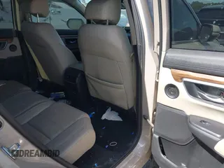 2018 Honda CR-V Touring with VIN 5J6RW1H98JL000031, listed as a IAAI auction lot 40605651 with 129,516 mi miles and . Bid and sale history available at DreamBid. Image 8.