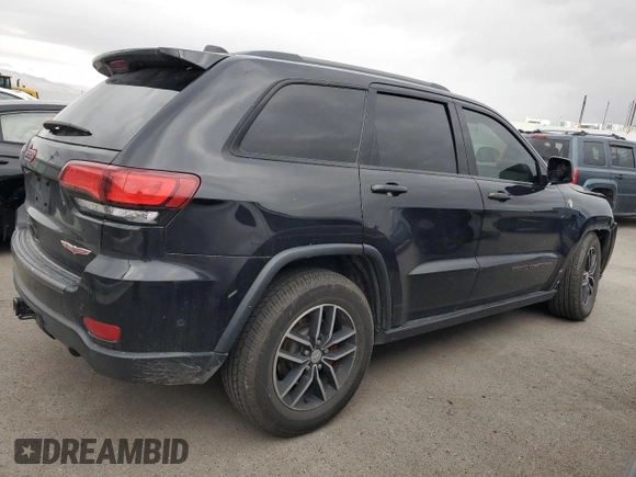 2017 Jeep Grand Cherokee Trailhawk with VIN 1C4RJFLT5HC692439, listed as a Copart auction lot 81093534 with 135,493 mi miles and Salvage title. Bid and sale history available at DreamBid. Image 3.