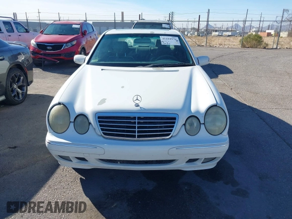 2002 Mercedes-Benz E-Class with VIN WDBJF82J62X076581, listed as a IAAI auction lot 41194976 with 235,453 mi miles. Bid and sale history available at carsss.com. Image 12.