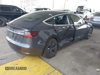 2020 Tesla Model 3 Standard Range Plus with VIN 5YJ3E1EA8LF743405, listed as a IAAI auction lot 41923592 with 81,901 mi miles. Bid and sale history available at carsss.com. Image 4.