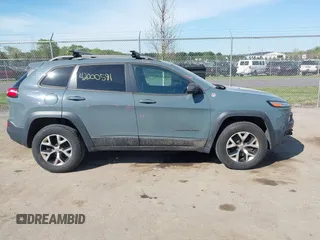 2015 Jeep Cherokee Trailhawk с VIN 1C4PJMBS2FW500538, выставлен на аукционе IAAI как лот 42000591 с пробегом 163 035 миль миль и . История ставок и продаж доступна на DreamBid. Изображение 13.