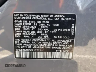 2023 Volkswagen Atlas SE z VIN 1V2JE2CAXPC216712, wystawiony jako Copart lot #58608325 z przebiegiem 22 649 mil mil oraz Szkoda całkowita • Salvage title. Historia ofert i sprzedaży dostępna na DreamBid. Obrazek 13.