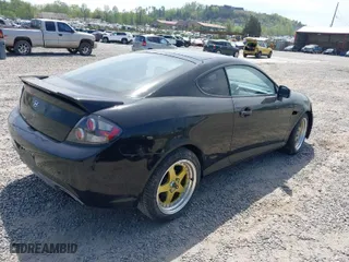 2007 Hyundai Tiburon GS with VIN KMHHM66D87U255336, listed as a IAAI auction lot 42035856 with 177,338 mi miles. Bid and sale history available at carsss.com. Image 4.