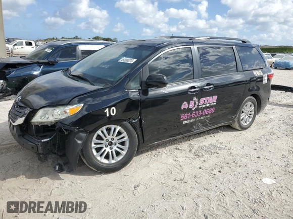 2015 Toyota Sienna XLE with VIN 5TDYK3DC7FS611488, listed as a Copart auction lot 45580075 with 193,344 mi miles and Salvage Title. Bid and sale history available at DreamBid. Image 1.