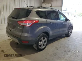2013 Ford Escape SE with VIN 1FMCU0GX7DUC84970, listed as a Copart auction lot 59611935 with 138,605 mi miles and Salvage title. Bid and sale history available at DreamBid. Image 3.
