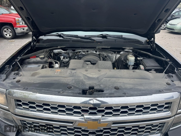 2014 Chevrolet Silverado 1500 LT with VIN 1GCVKREH1EZ169899, listed as a IAAI auction lot 42143501 with 124,789 mi miles and . Bid and sale history available at DreamBid. Image 9.