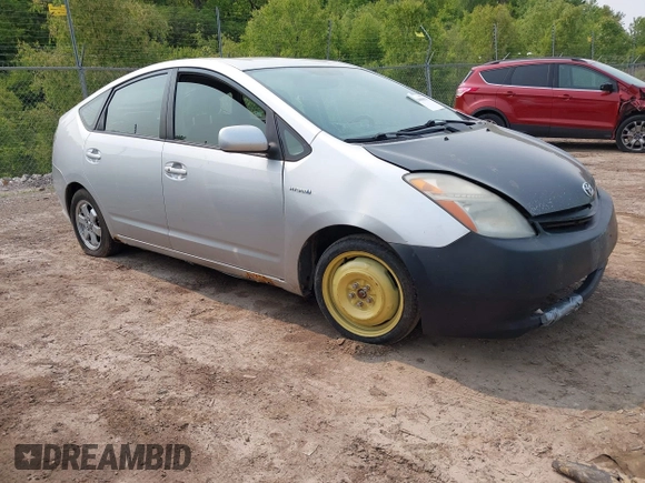 2007 Toyota Prius z VIN JTDKB20U677694177, wystawiony jako IAAI lot #42408658 z przebiegiem 261 175 mil mil oraz . Historia ofert i sprzedaży dostępna na DreamBid. Obrazek 1.