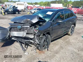 2021 Toyota RAV4 Hybrid XSE with VIN 2T3E6RFV2MW017668, listed as a IAAI auction lot 42008581 with Not provided miles and . Bid and sale history available at DreamBid. Image 18.
