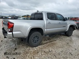 2020 Toyota Tacoma SR5 with VIN 5TFAZ5CNXLX095175, listed as a Copart auction lot 54339355 with 61,187 mi miles and Salvage title. Bid and sale history available at DreamBid. Image 3.