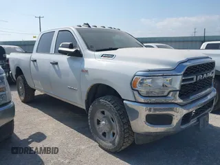 2021 Ram 2500 Tradesman z VIN 3C6UR5CJ1MG571126, wystawiony jako IAAI lot #42438146 z przebiegiem 66 780 mil mil oraz . Historia ofert i sprzedaży dostępna na DreamBid. Obrazek 1.