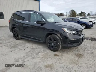 2021 Honda Pilot Special Edition with VIN 5FNYF6H24MB029437, listed as a Copart auction lot 48829155 with 60,875 mi miles and Salvage Title. Bid and sale history available at DreamBid. Image 4.