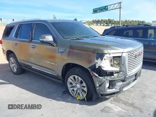 2021 GMC Yukon Denali with VIN 1GKS2DKLXMR230331, listed as a IAAI auction lot 41333736 with 1 mi miles. Bid and sale history available at carsss.com. Image 1.