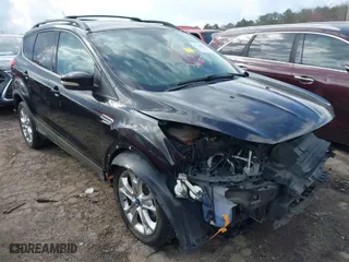 2013 Ford Escape SEL with VIN 1FMCU9HX1DUC18594, listed as a IAAI auction lot 41748991 with 138,948 mi miles. Bid and sale history available at carsss.com. Image 1.