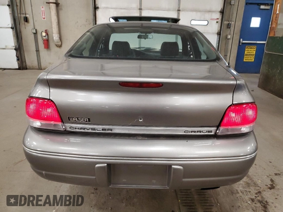 1999 Chrysler Cirrus LXi z VIN 1C3EJ56H4XN528008, wystawiony jako Copart lot #80166314 z przebiegiem 127 767 mil mil oraz Tytuł czysty. Historia ofert i sprzedaży dostępna na DreamBid. Obrazek 6.