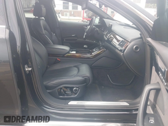 2015 Audi A8 3.0T with VIN WAU3GAFD7FN037726, listed as a IAAI auction lot 41793699 with 100,773 mi miles and . Bid and sale history available at DreamBid. Image 5.
