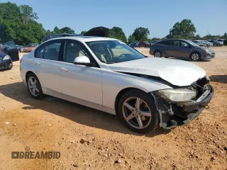 2014 BMW 3 Series 328i xDrive with VIN WBA3B5C51EF958576, listed as a Copart auction lot 62089375 with 148,140 mi miles and Salvage title. Bid and sale history available at DreamBid. Image 4.