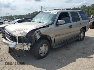 2003 GMC Yukon SLE z VIN 1GKEC13V33R174109, wystawiony jako Copart lot #54965775 z przebiegiem Nie podano mil oraz Szkoda całkowita • Salvage title. Historia ofert i sprzedaży dostępna na DreamBid. Obrazek 1.