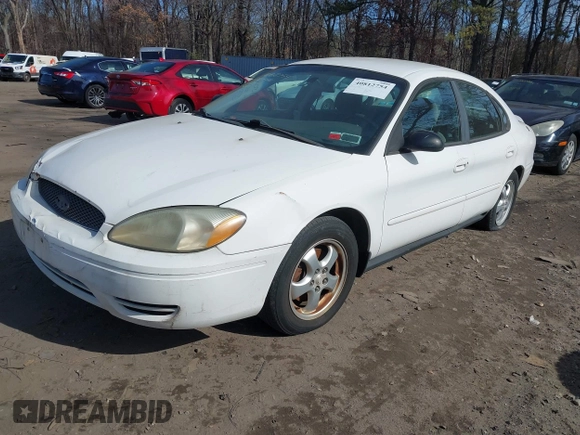 2006 Ford Taurus SE Standard with VIN 1FAHP53U96A196202, listed as a IAAI auction lot 41624553 with 203,188 mi miles and . Bid and sale history available at DreamBid. Image 2.