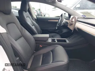 2023 Tesla Model 3 z VIN 5YJ3E1EA0PF511158, wystawiony jako IAAI lot #42210455 z przebiegiem 22 291 mil mil oraz . Historia ofert i sprzedaży dostępna na DreamBid. Obrazek 5.