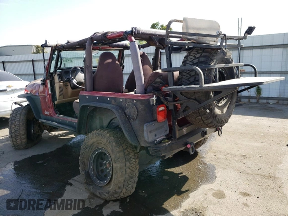 1999 Jeep Wrangler Sport with VIN 1J4FY19S5XP493117, listed as a Copart auction lot 57490792 with Not provided miles and Salvage title. Bid and sale history available at DreamBid. Image 3.