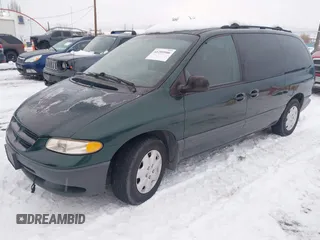 1999 Dodge Grand Caravan with VIN 1B4GT44LXXB609853, listed as a IAAI auction lot 41299906 with 211,337 mi miles and . Bid and sale history available at DreamBid. Image 2.