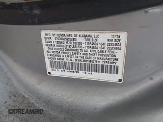 2005 Honda Odyssey TOURING with VIN 5FNRL38815B027811, listed as a IAAI auction lot 42105642 with 303,913 mi miles. Bid and sale history available at carsss.com. Image 9.