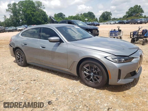 2023 BMW i4 eDrive40 with VIN WBY73AW08PFN75939, listed as a Copart auction lot 56928064 with 10,295 mi miles and Salvage Title. Bid and sale history available at carsss.com. Image 4.