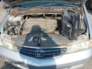 2003 Honda Odyssey EX z VIN 5FNRL18613B111952, wystawiony jako IAAI lot #40852383 z przebiegiem Nie podano mil oraz . Historia ofert i sprzedaży dostępna na DreamBid. Obrazek 9.