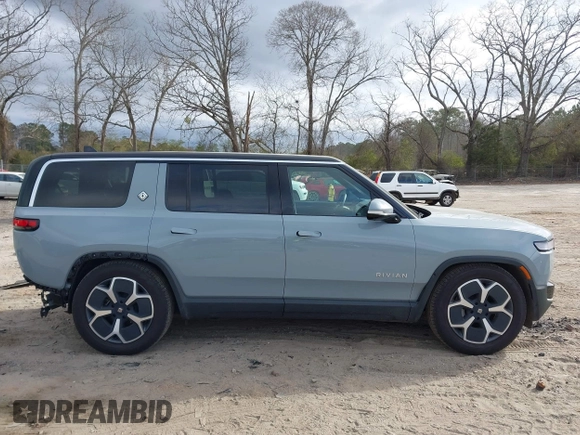 2024 Rivian R1S Adventure with VIN 7PDSGBBA1RN040036, listed as a IAAI auction lot 41694635 with 13,855 mi miles. Bid and sale history available at carsss.com. Image 14.